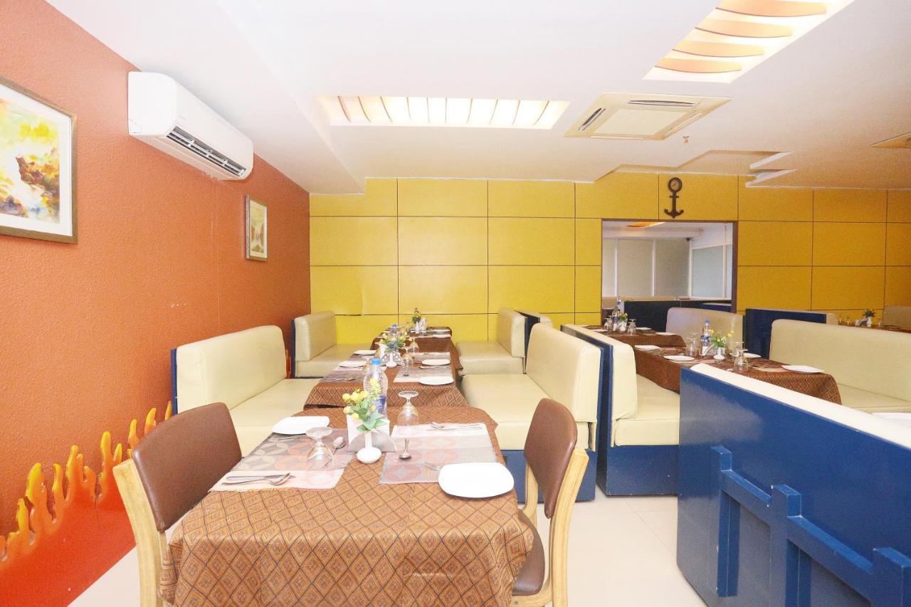 Capital O 45944 Club 7 Hotell Tiruvalla Eksteriør bilde